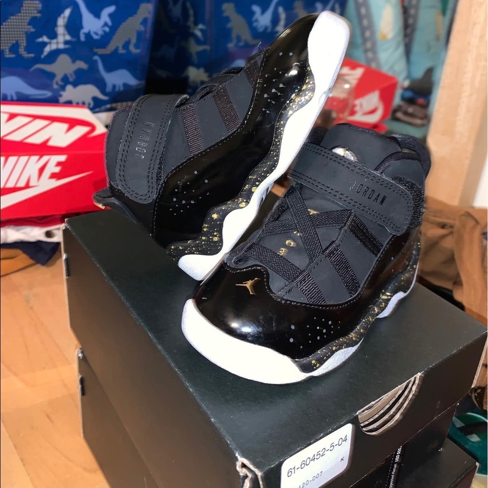 Black and gold Jordans